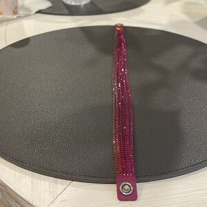 Purple sparkles on leather snap bracelet